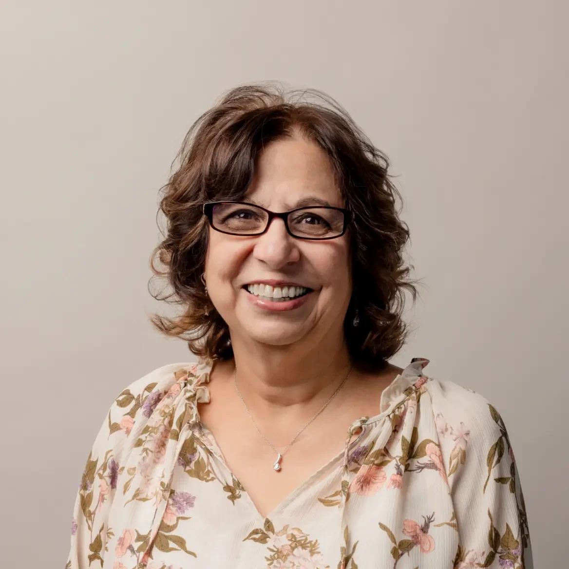 Portrait-style photograph of a Wealthsimple Tax expert, Fazi Kiani.