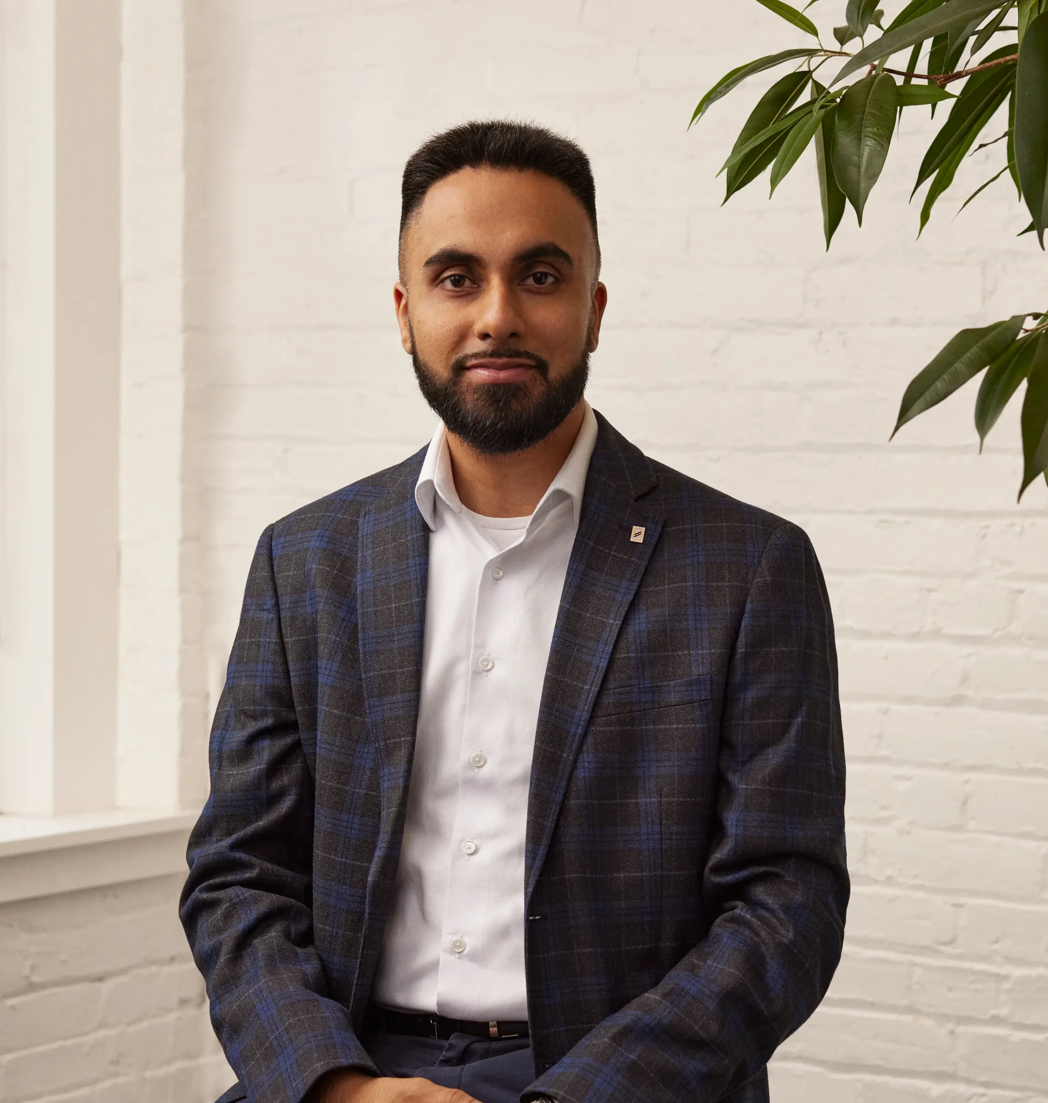 Headshot of one of Wealthsimple's advisors, Sunmeet.