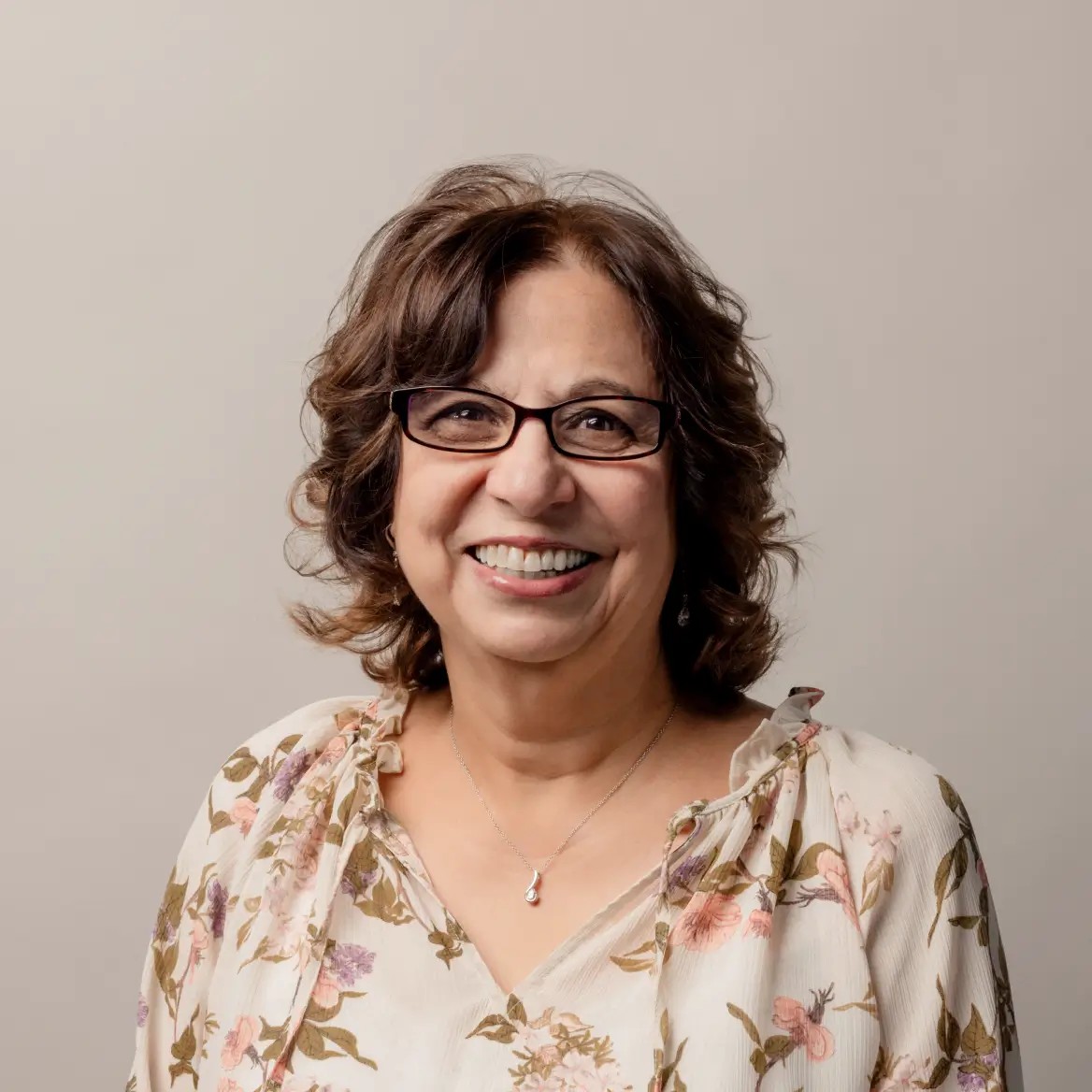 Portrait-style photograph of a Wealthsimple Tax expert, Fazi Kiani.