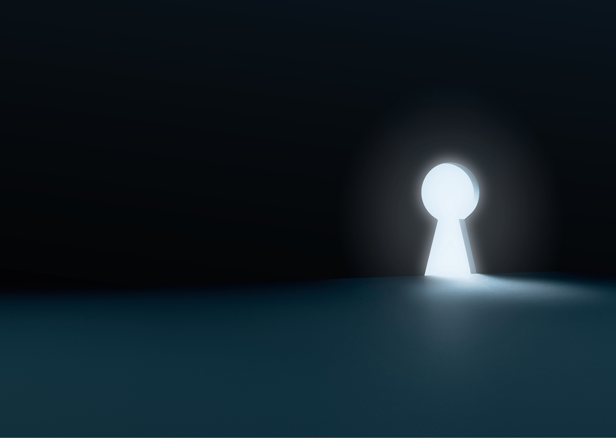 An illuminated keyhole on a dark backdrop.