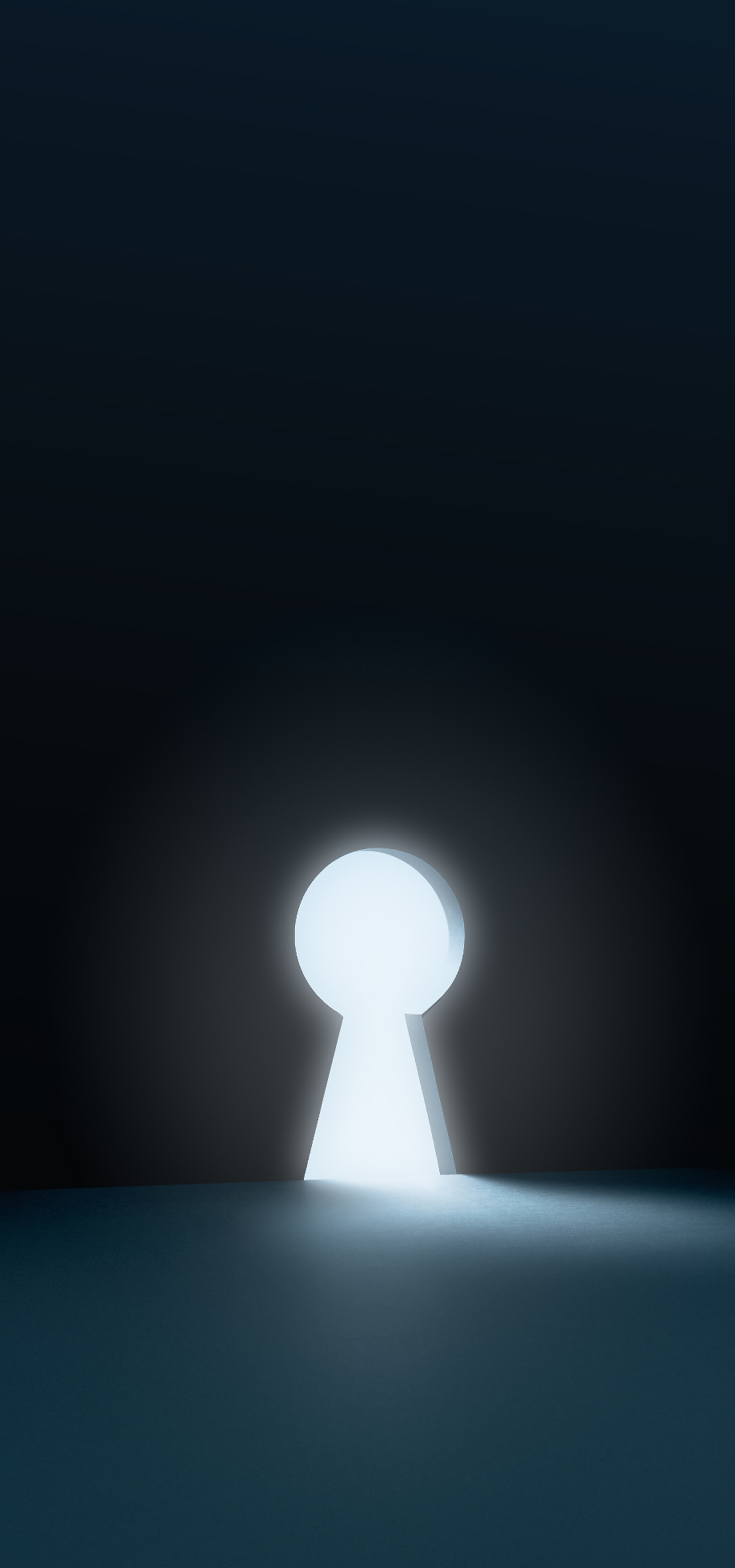 An illuminated keyhole on a dark backdrop.