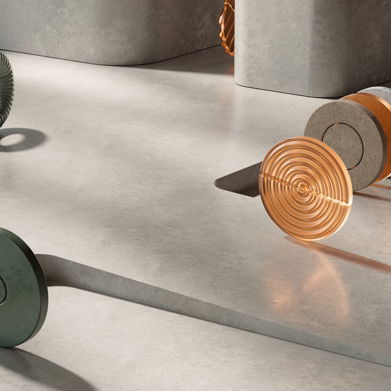 Des formes circulaires en 3D roulant sur le côté sur un plancher de granite.