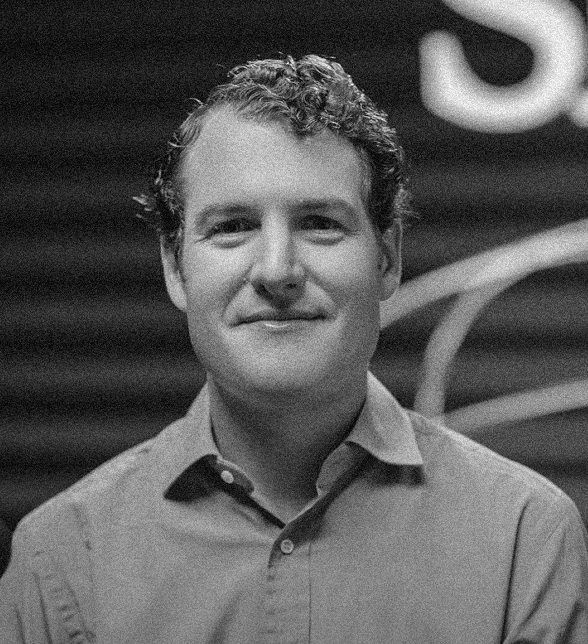 A headshot of Matthew Karasz.