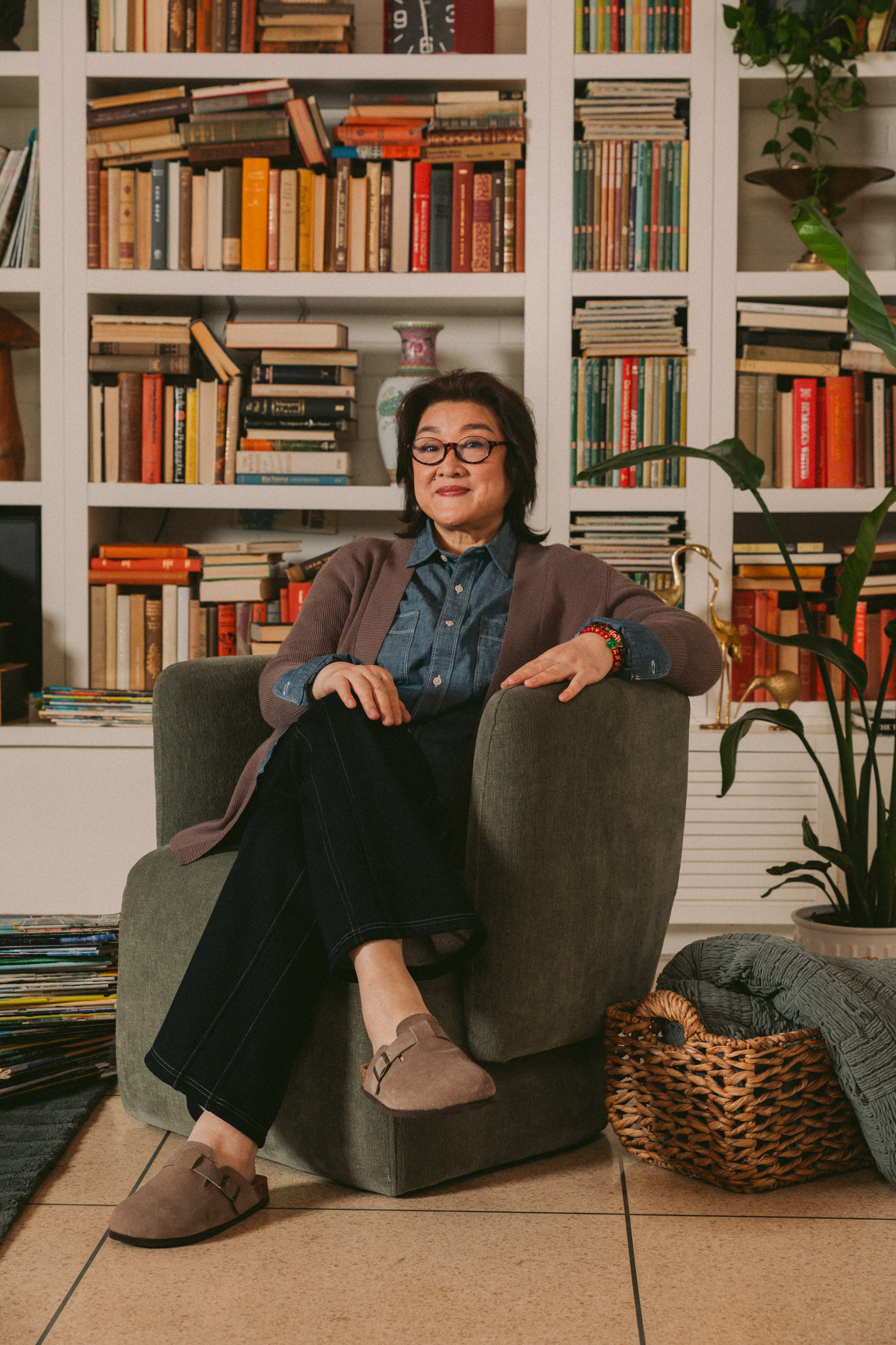 Confident women sitting comfortably in her home